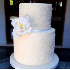 White Wedding cake with stenciling